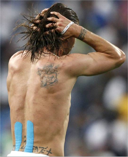 Tattoo Soccer Players: sergio ramos with tattoos in back body and hand